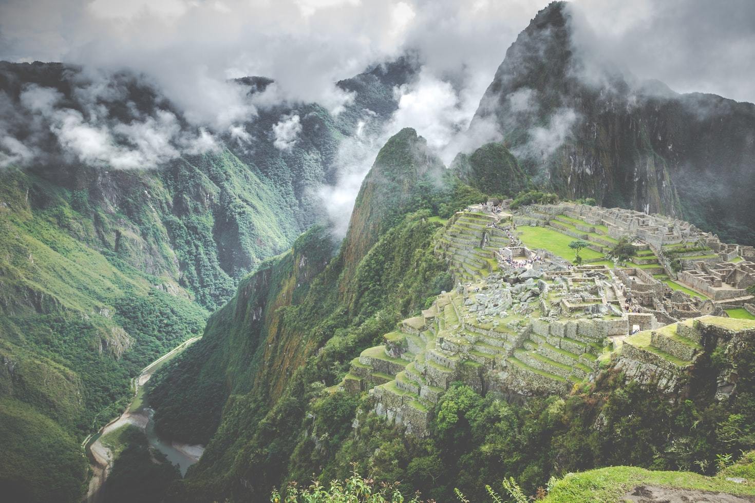 a view of a mountain with a village in the middle of it