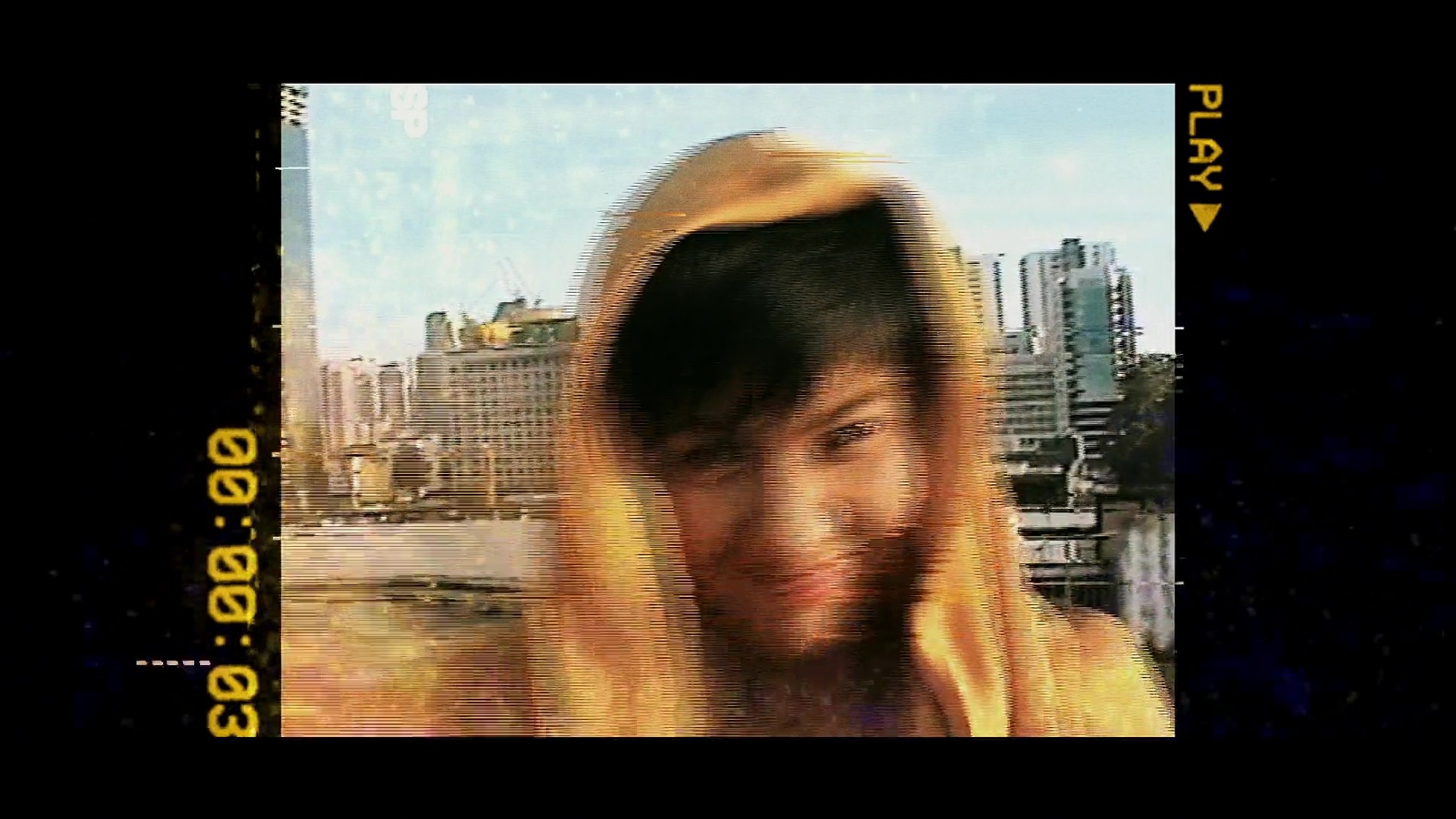 a blurry photo of a man with long hair