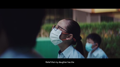 a woman wearing a face mask and glasses