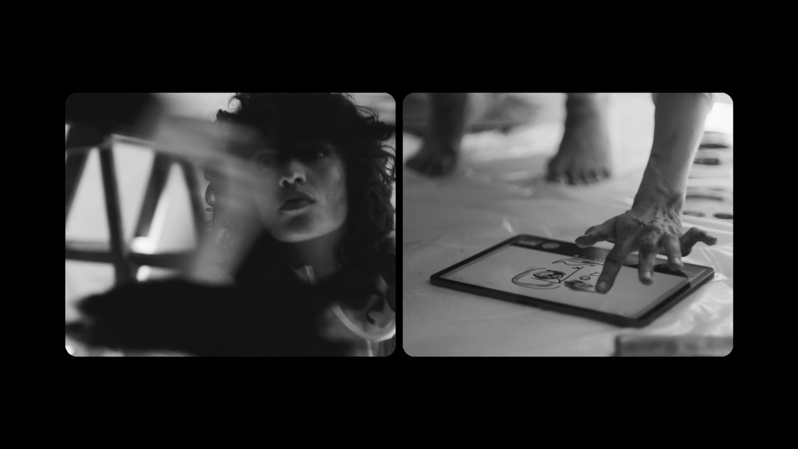 a black and white photo of a woman's hands on a table