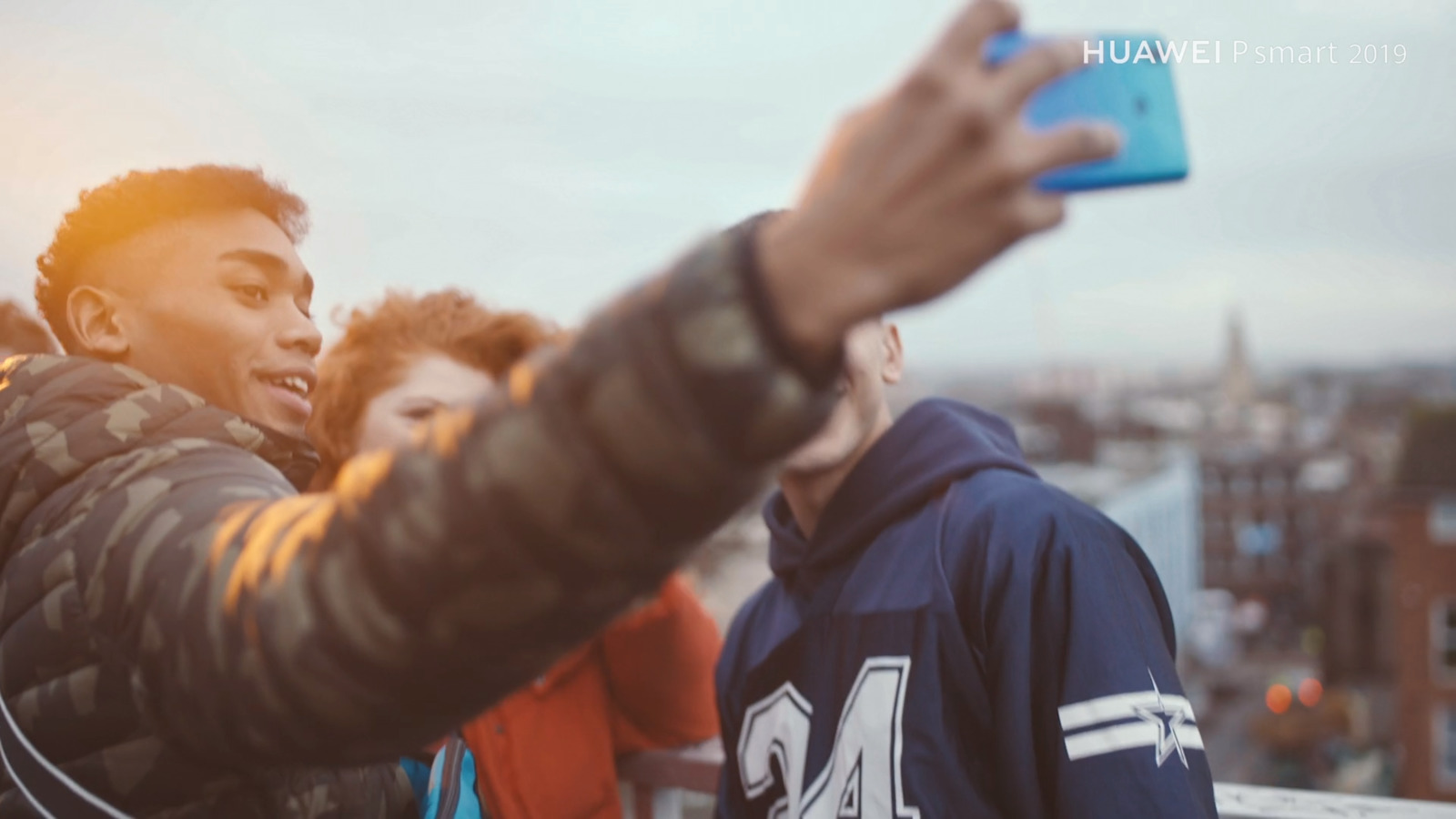 a man taking a picture with his cell phone