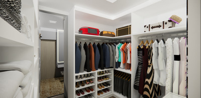 a walk in closet with a lot of clothes