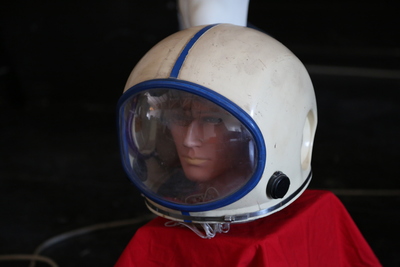 a mannequin wearing a space suit and helmet