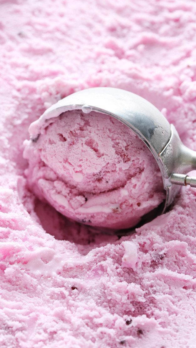 a scoop of pink ice cream in a bowl