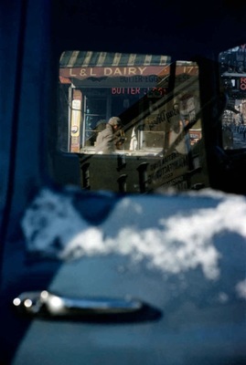 the back window of a car with snow on it