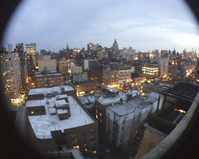 a view of a city at night from a window