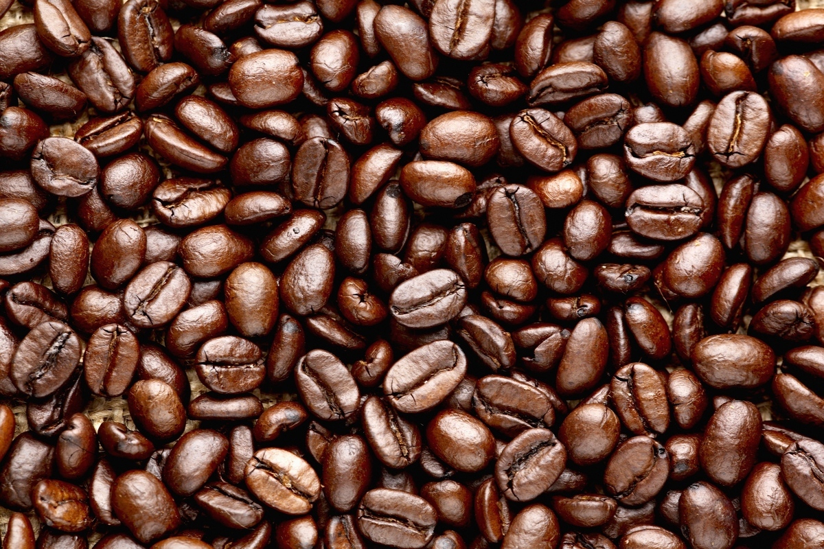 a pile of coffee beans sitting next to each other