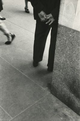 a black and white photo of a man in a suit