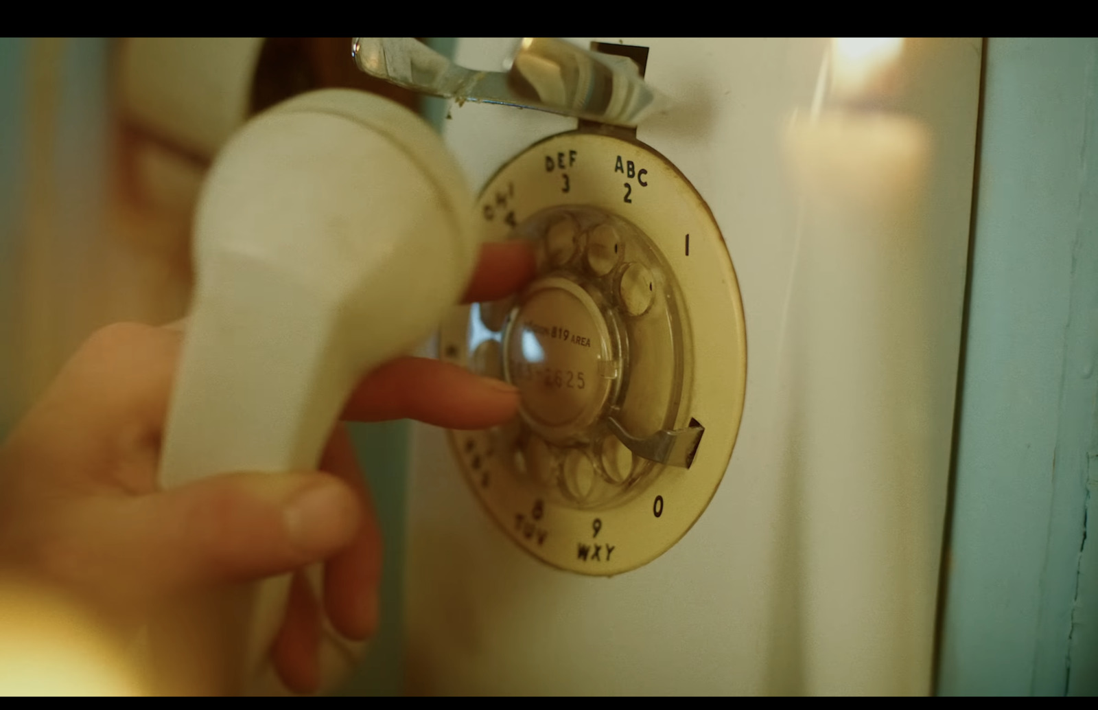 a close up of a person pressing a button