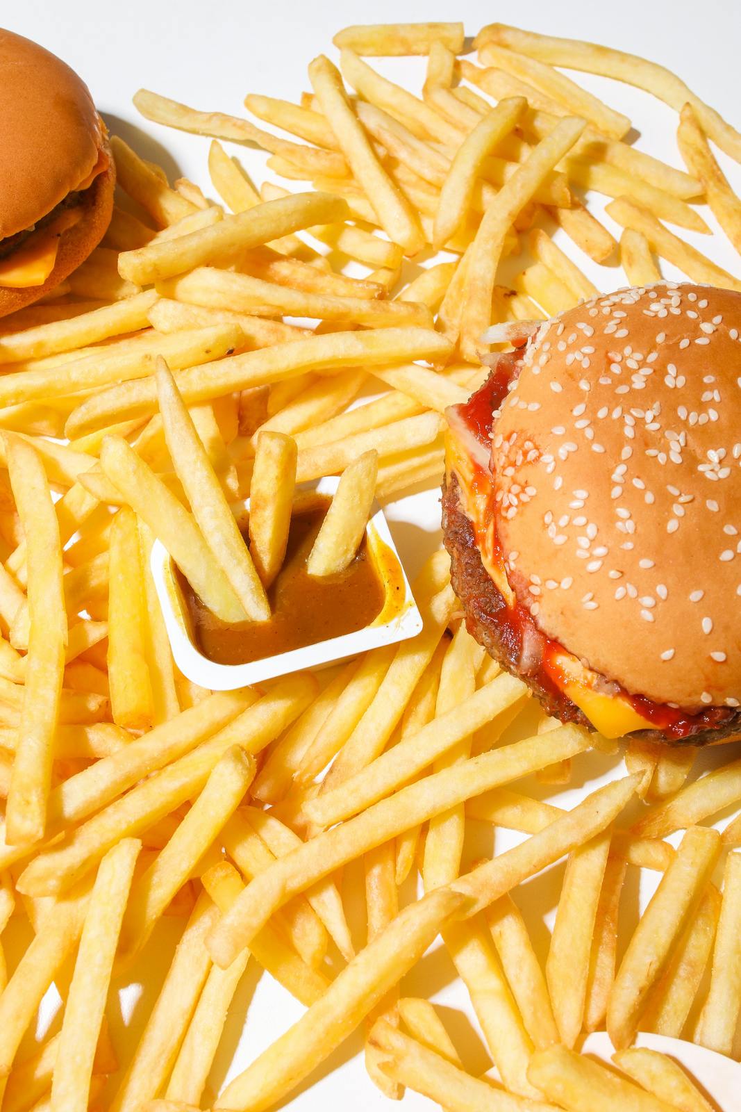 a hamburger and french fries on a plate