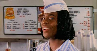 a woman wearing a hat in a fast food restaurant