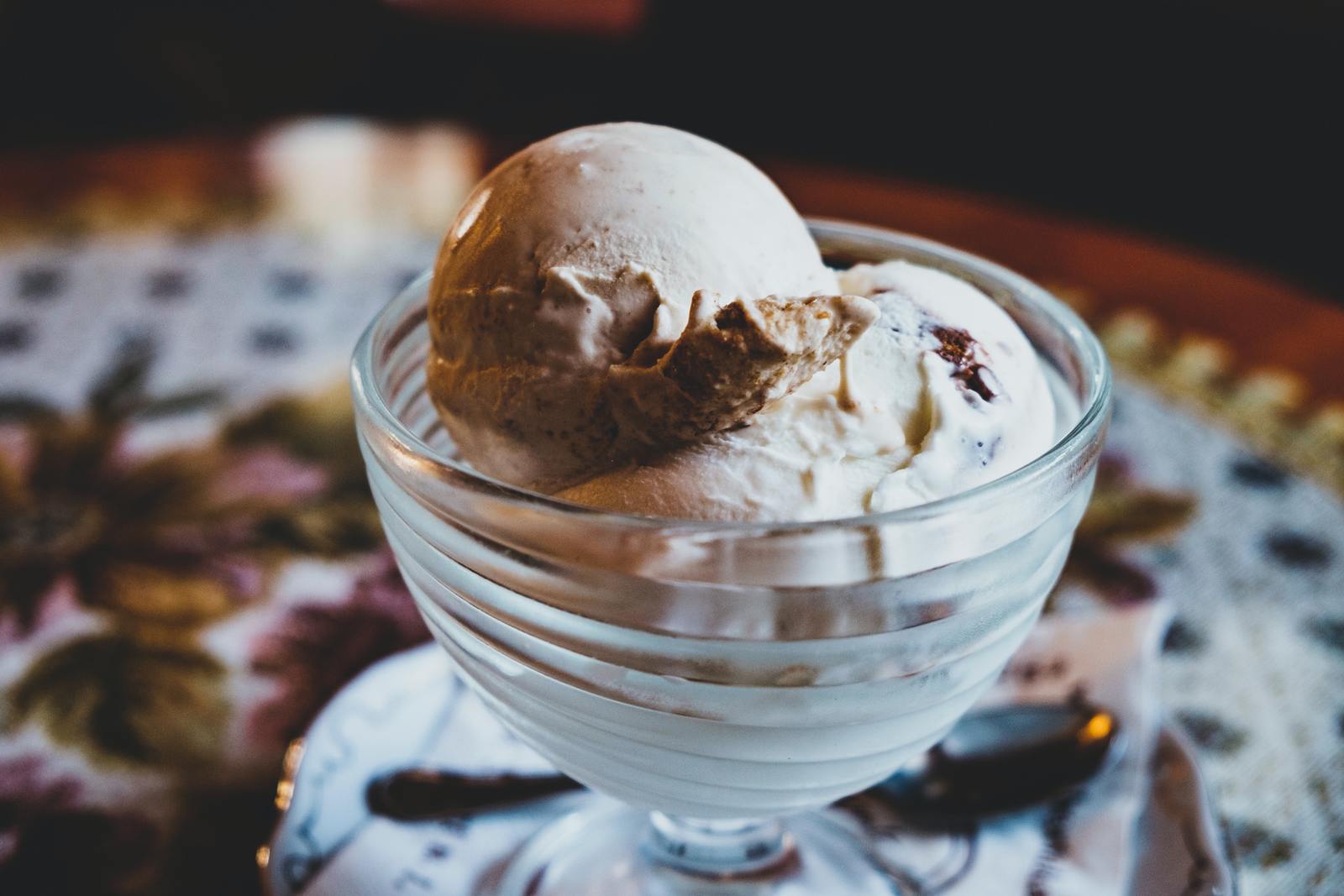 a bowl of ice cream on a table