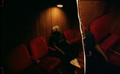 a couple of red chairs sitting next to each other