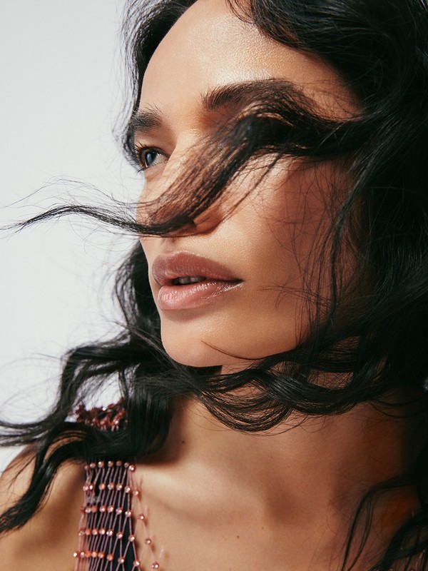 a close up of a woman with long hair