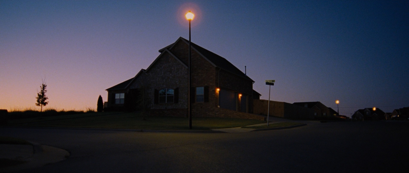 a building with a street light in front of it