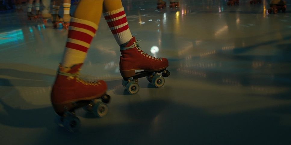 a pair of roller skates in a skating rink