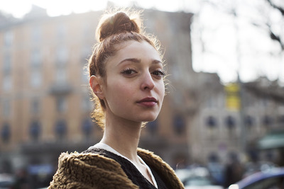 a woman with a bun in her hair