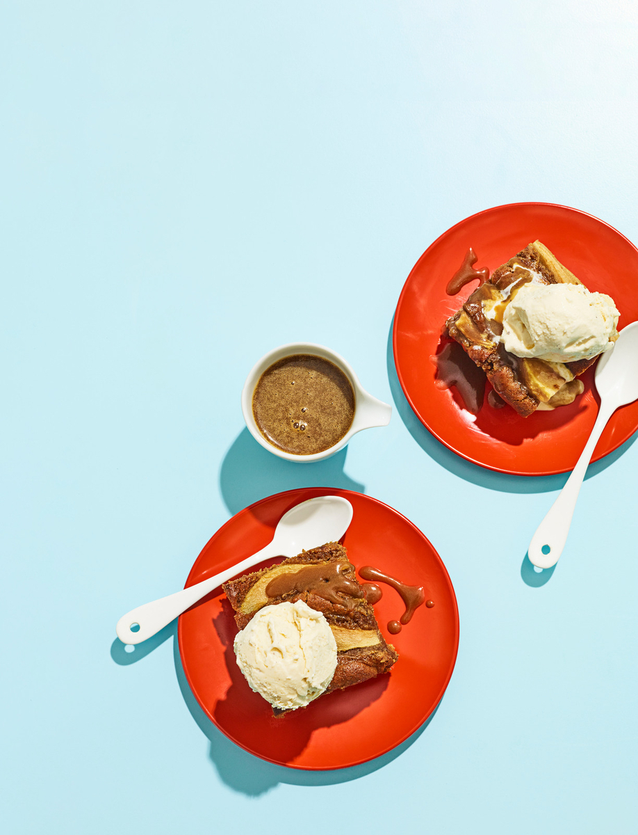 two plates of food on a blue table