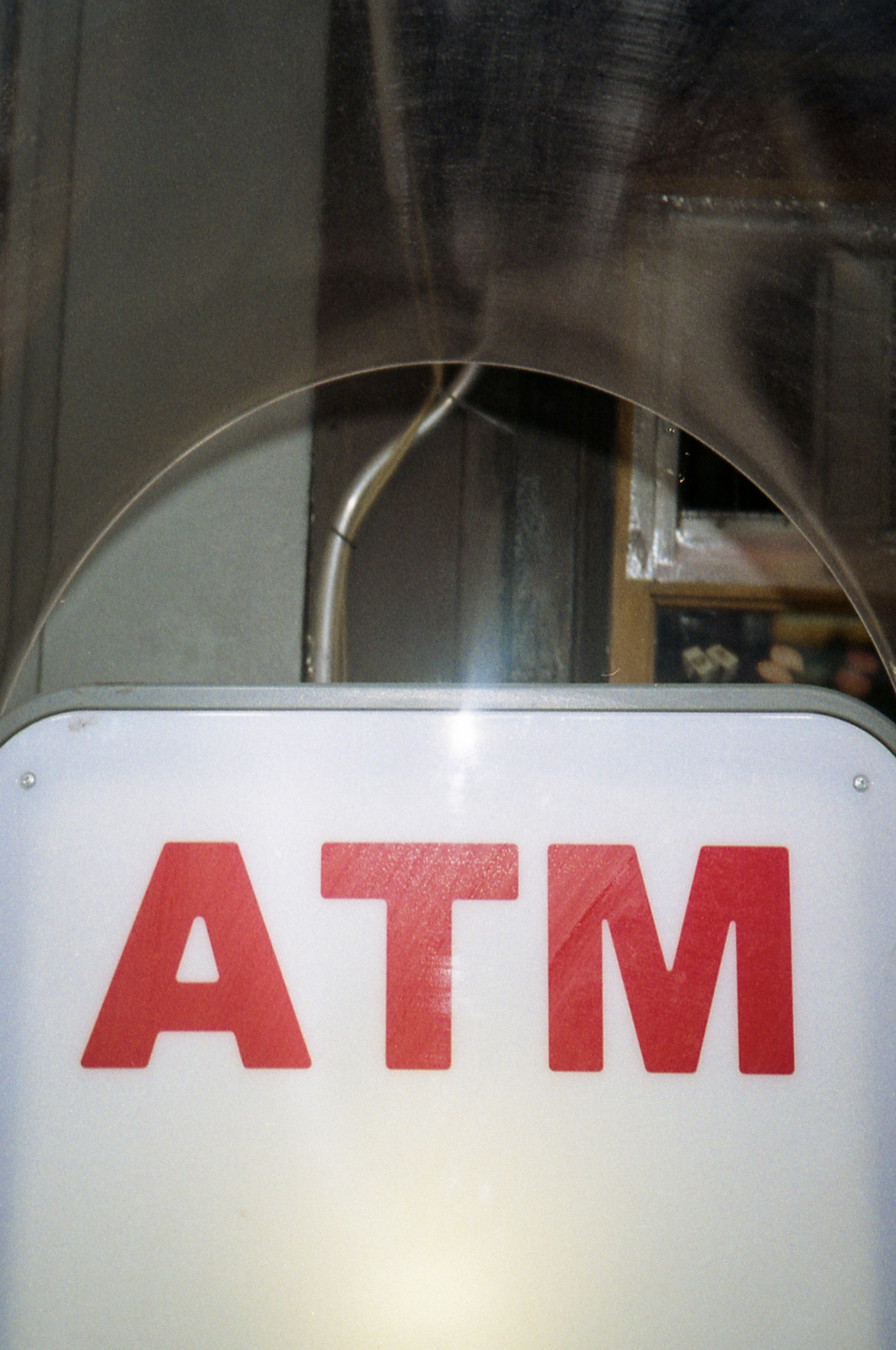 a close up of a street sign with a building in the background