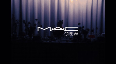 the mac crew logo is displayed on a curtain