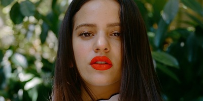 a woman with red lipstick on her lips