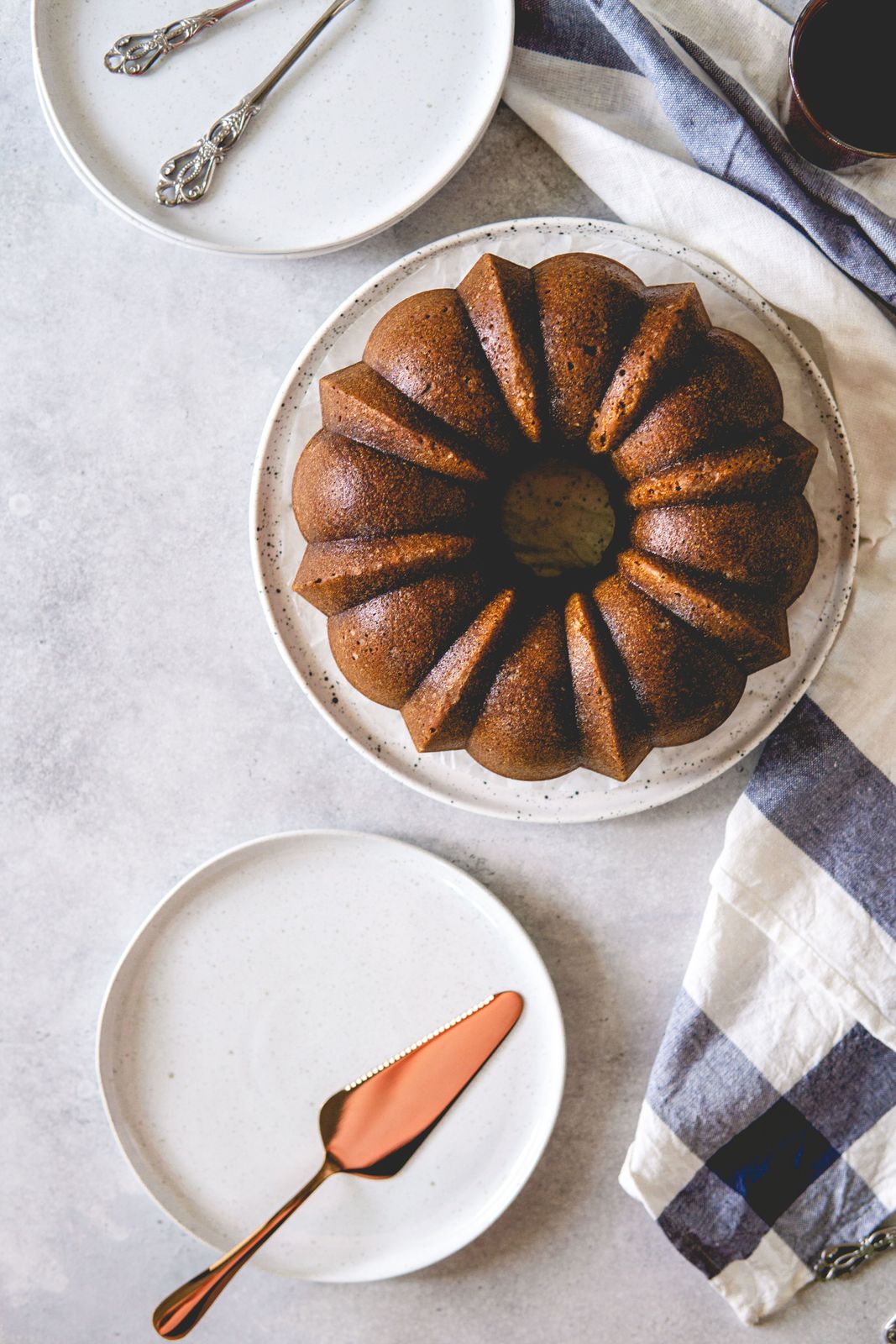 a bundt cake sitting on top of a white plate