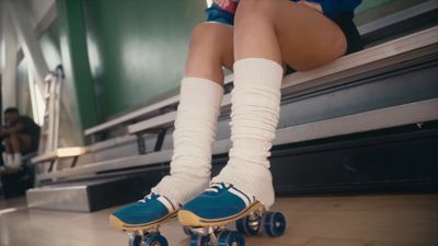 a person riding a skateboard down a hallway