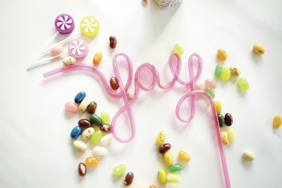 a white plate topped with candies and candy