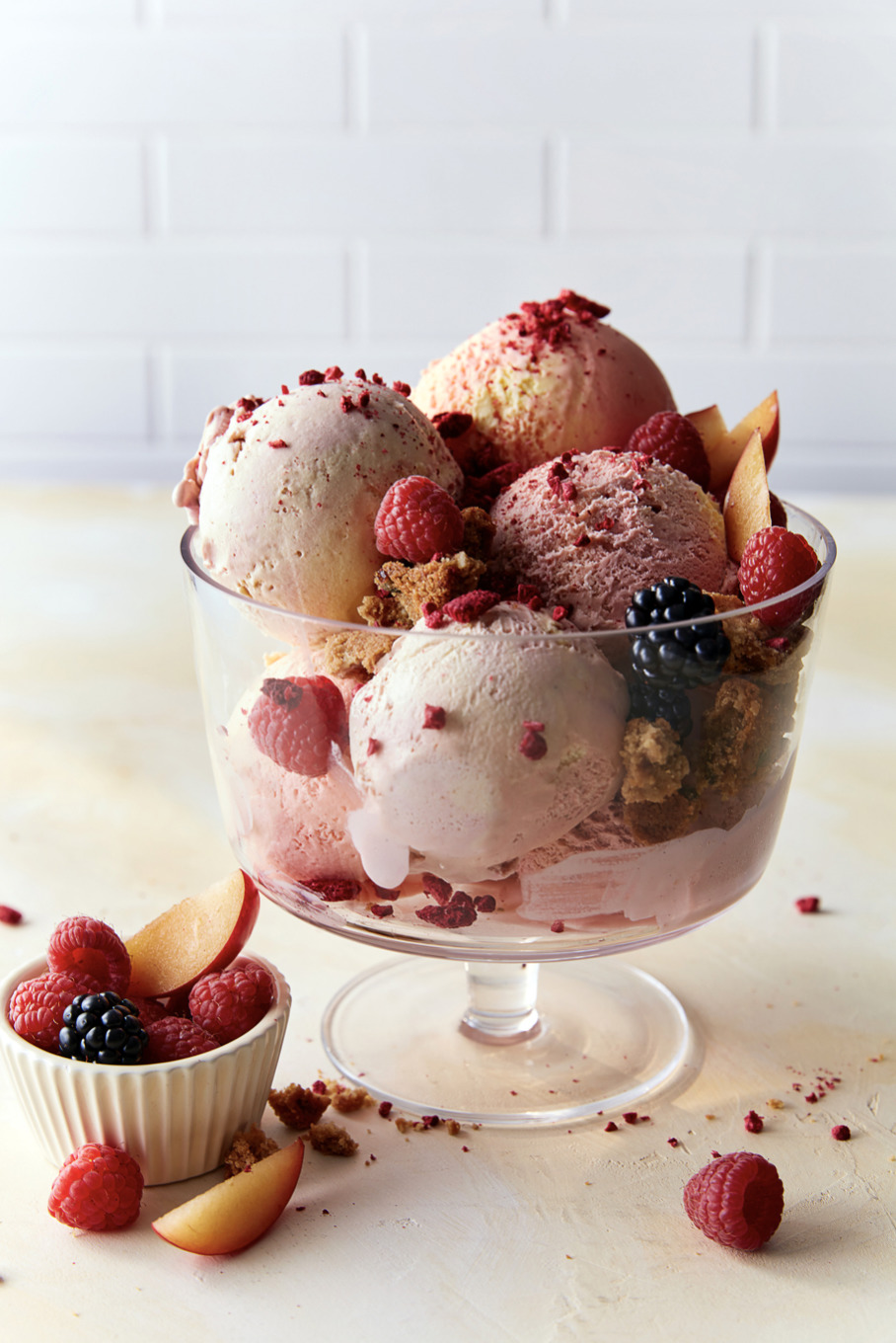 a bowl filled with ice cream and fruit