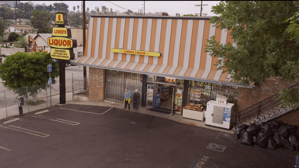 a view of a store from the top of a building