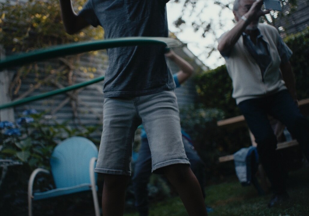 a group of people playing a game of frisbee