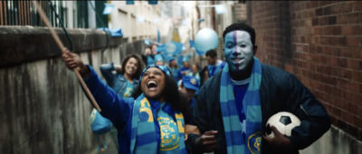 a group of people wearing blue and yellow outfits