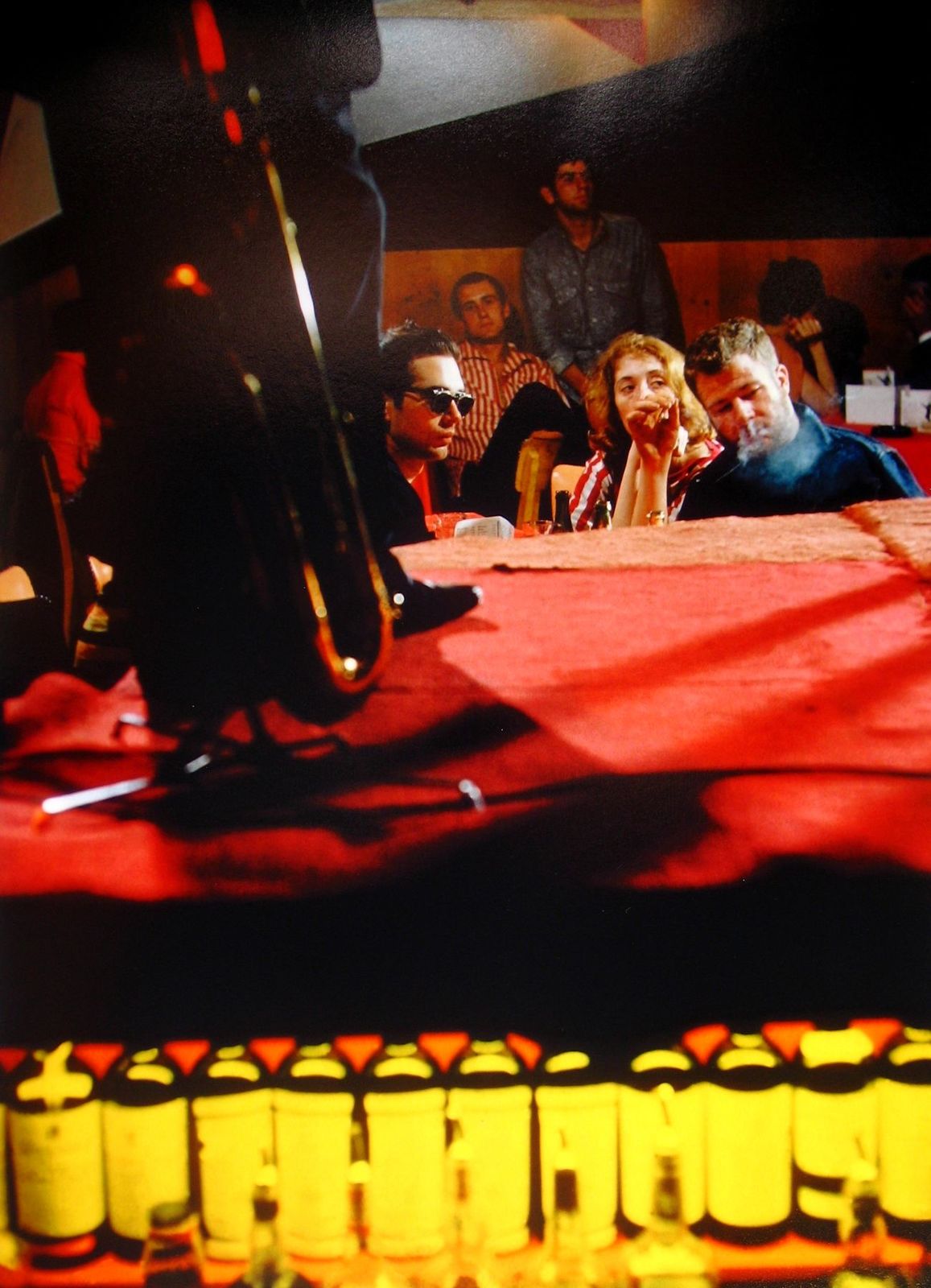 a group of people sitting around a table