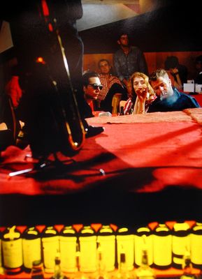 a group of people sitting around a table