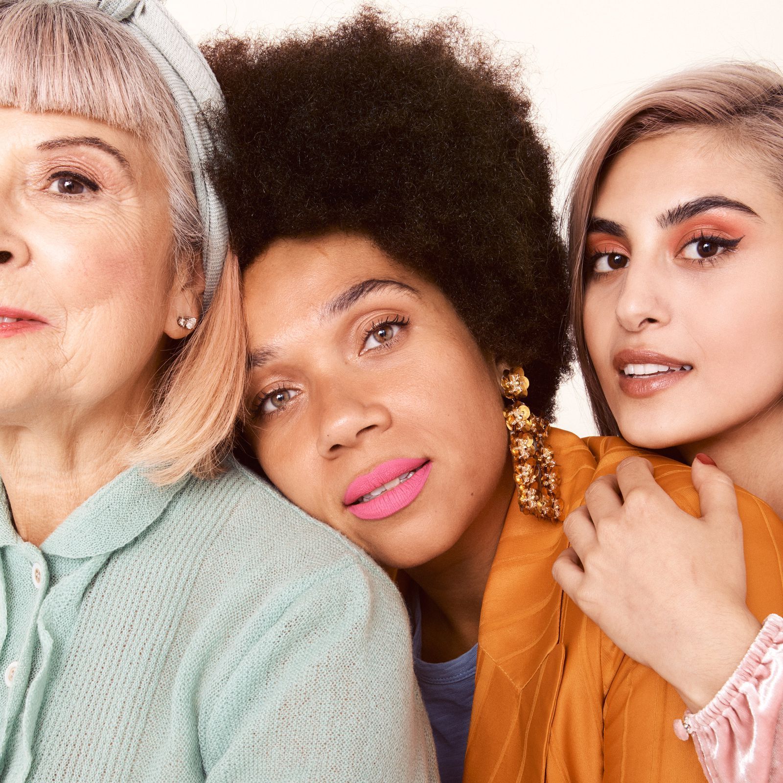 a group of women standing next to each other