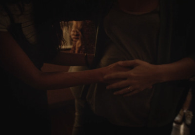 a couple of people standing next to each other