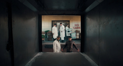 a group of people walking into a building