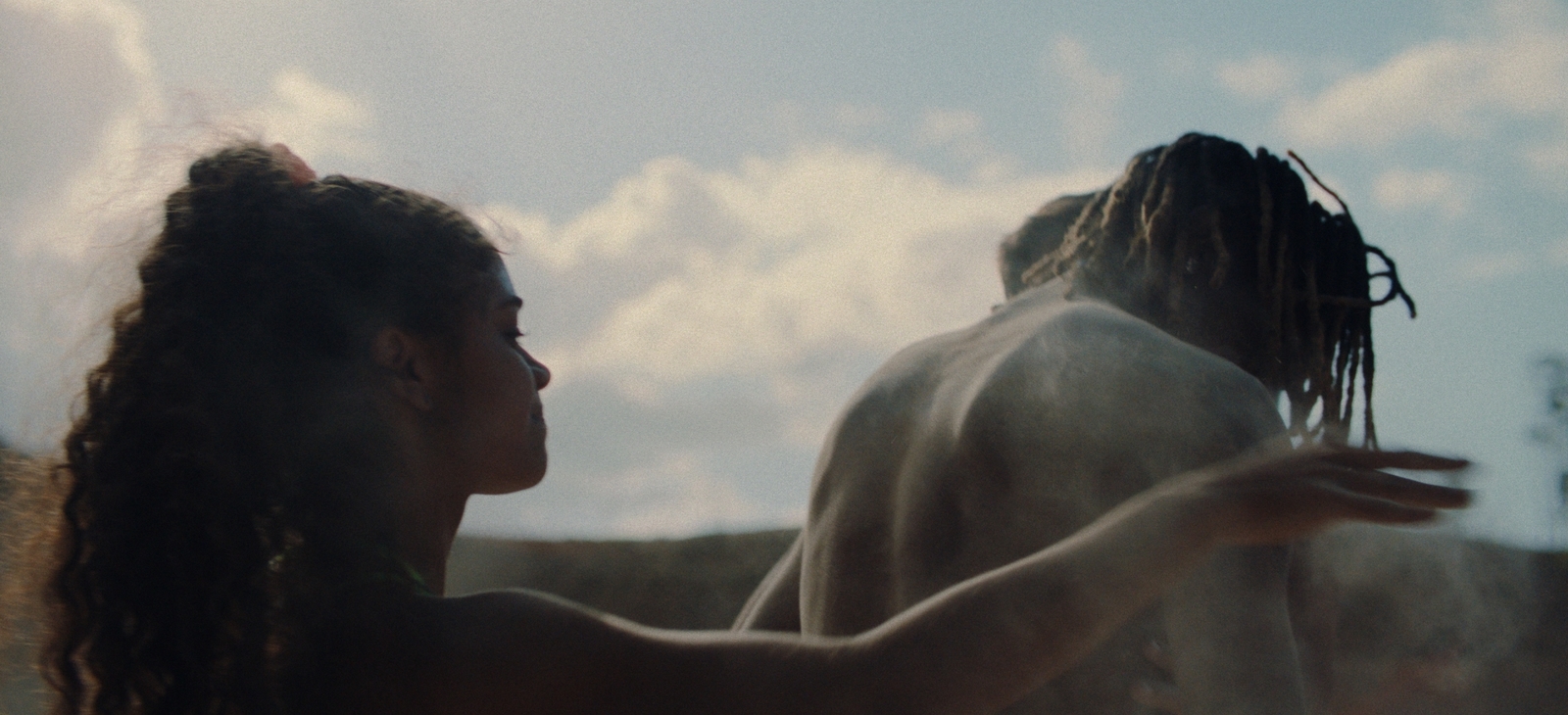 a man and a woman standing next to each other