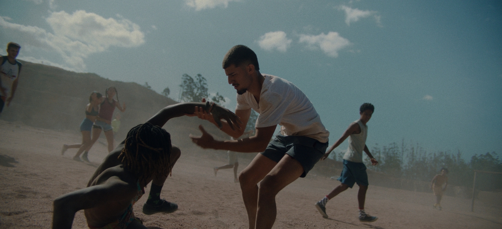 a group of young men playing a game of soccer