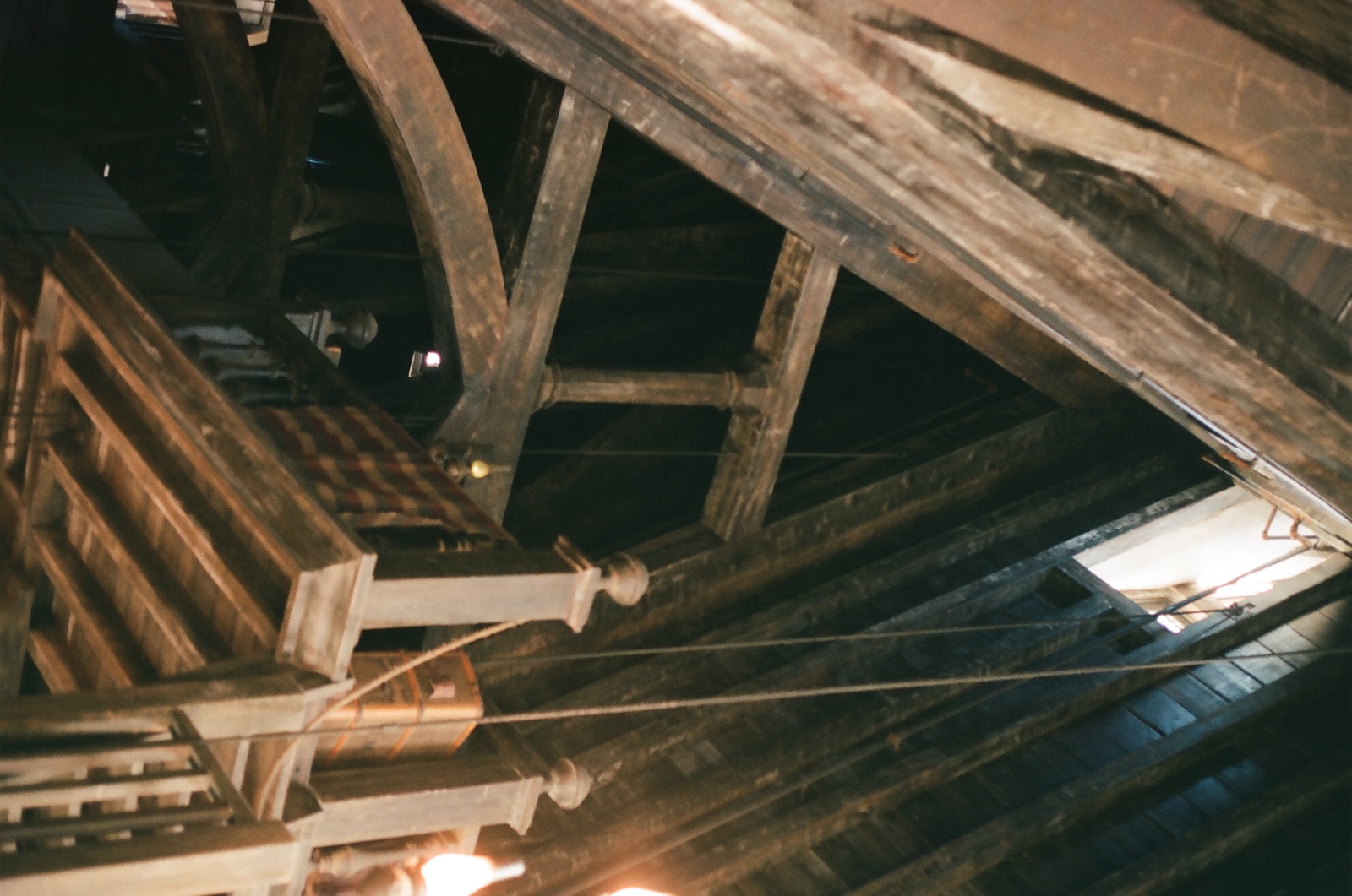 an overhead view of a wooden structure with lights