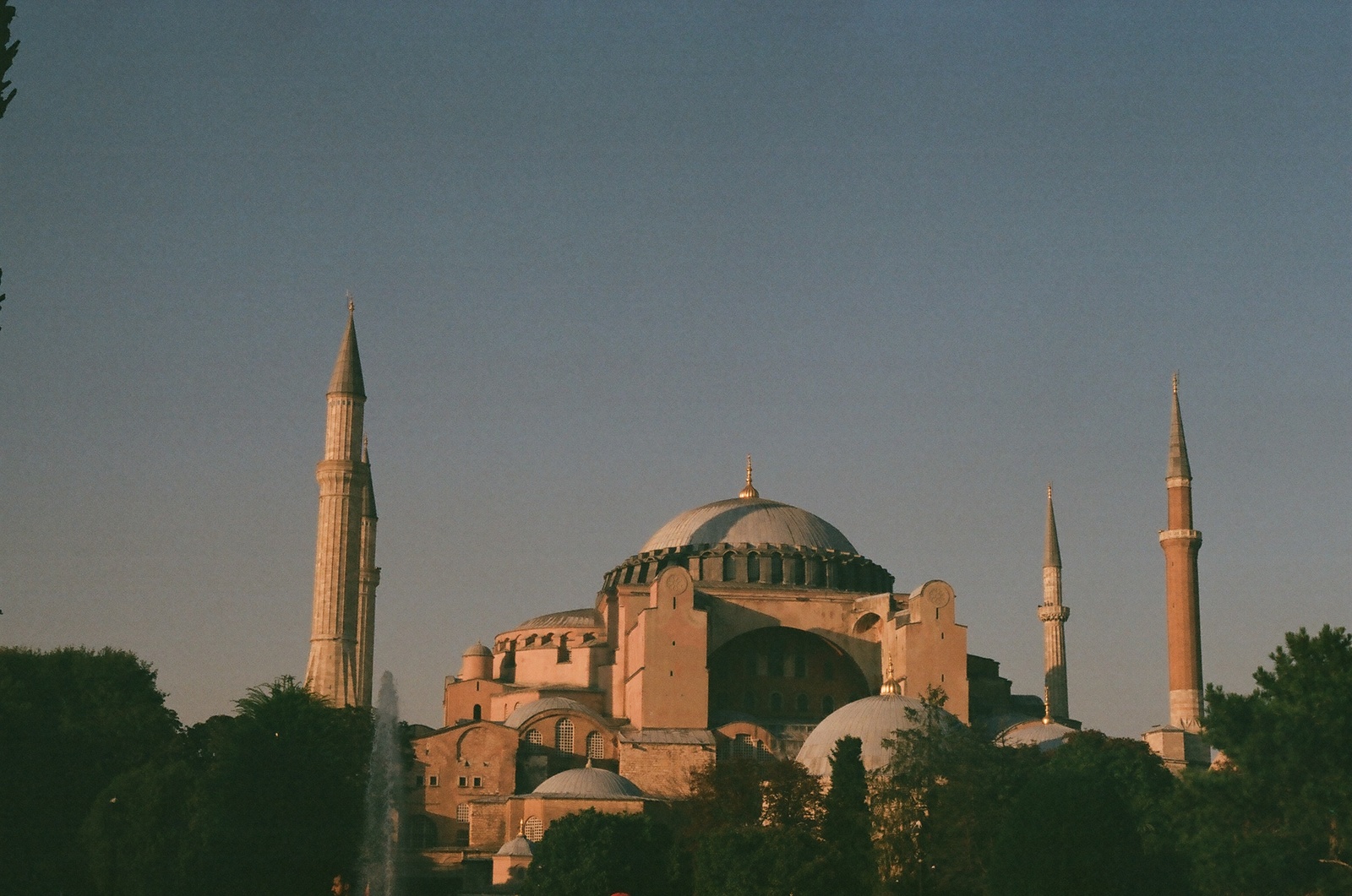 a large building with many spires in the background