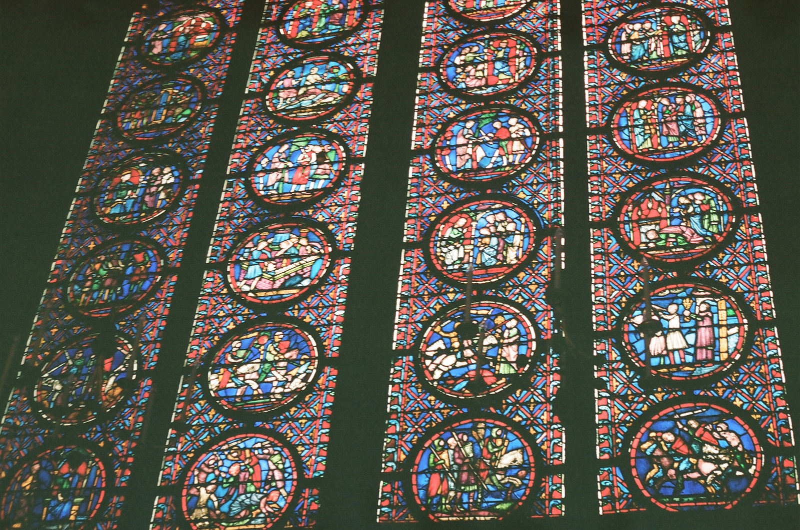 a large stained glass window in a building