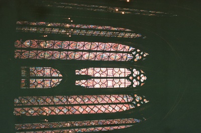 a large stained glass window in a building