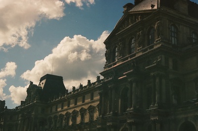 a large building with a clock on the top of it