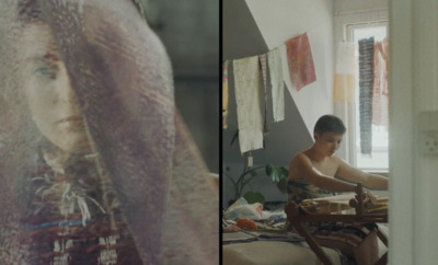 a man sitting in a chair next to a window