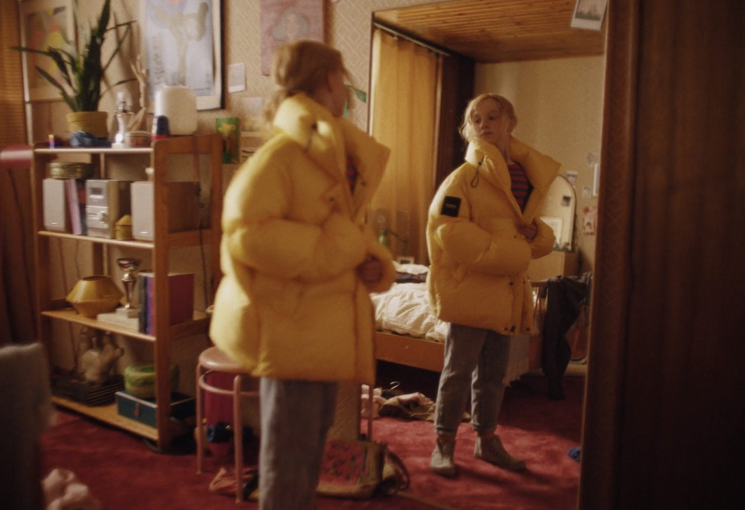 a man and a woman standing in a room