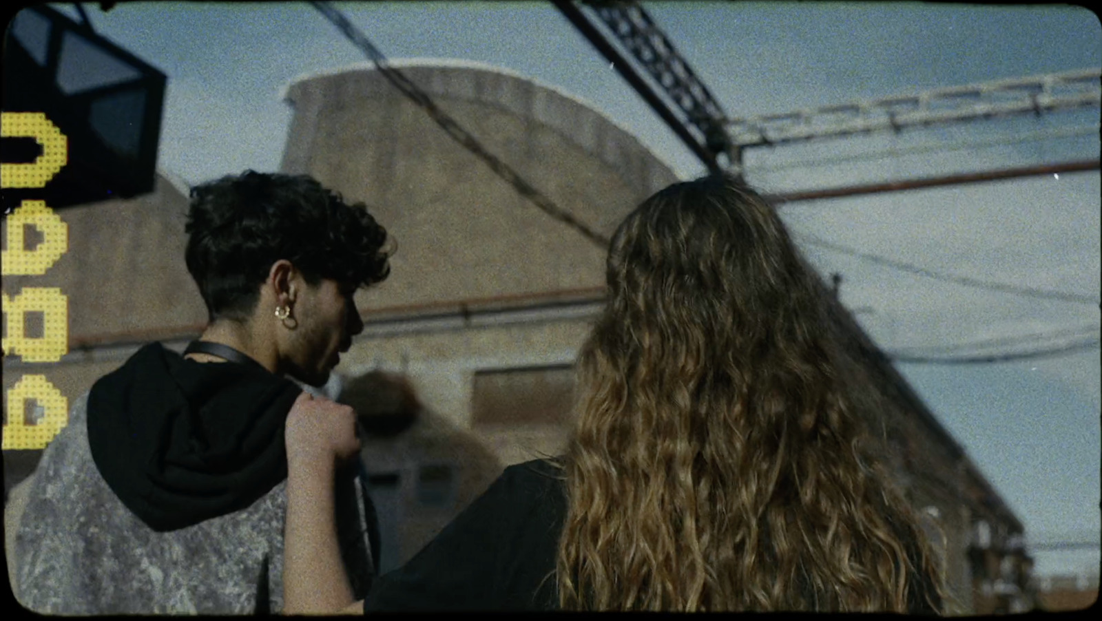 a man and a woman standing next to each other