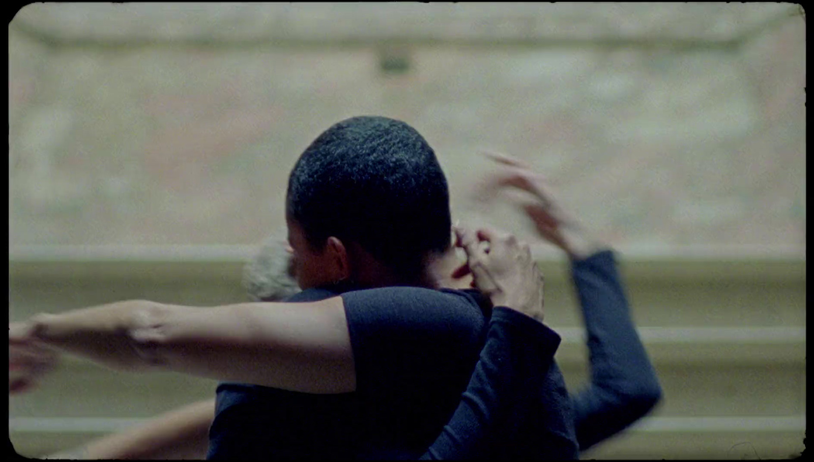 a man and a woman doing a yoga pose