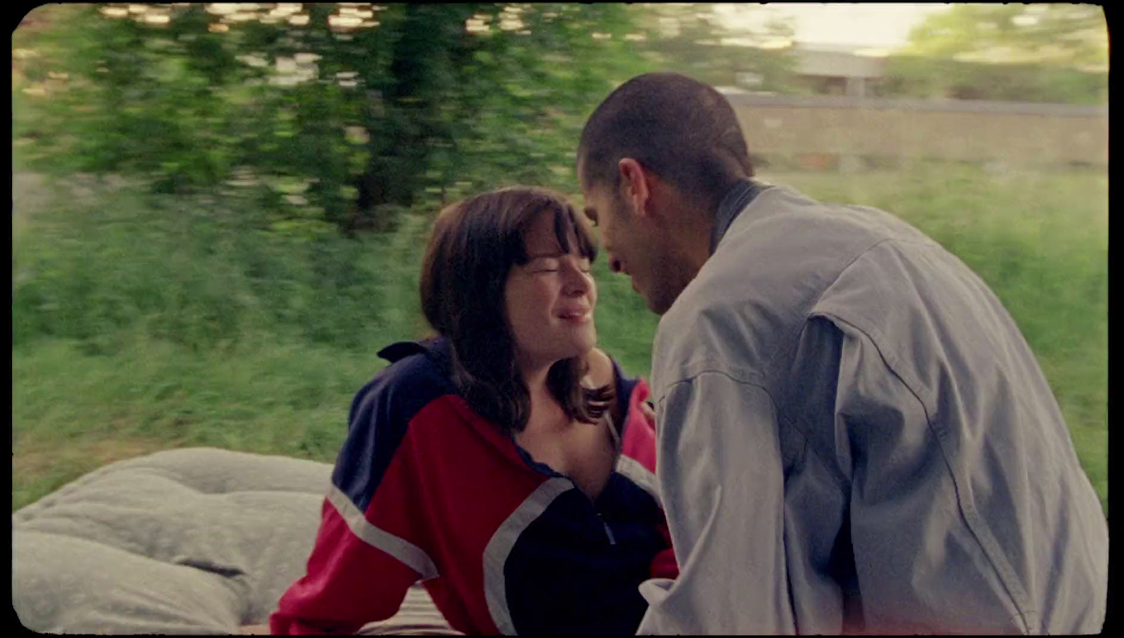 a man and a woman standing next to each other