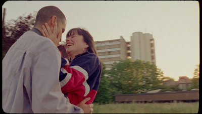 a man and a woman standing next to each other